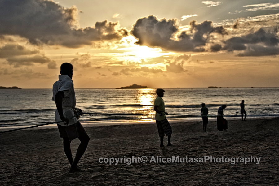 Sunrise & fishermen pulling in the nets on Nilaveli beach