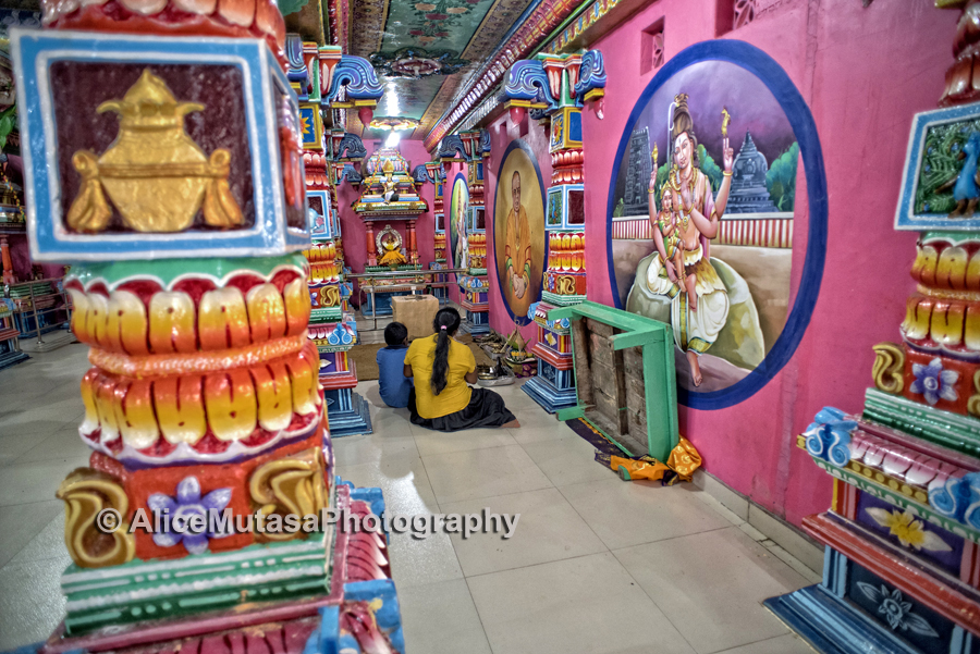A quiet moment in the mad psychedelic interior of the Kali Kovil Temple, Trincomali