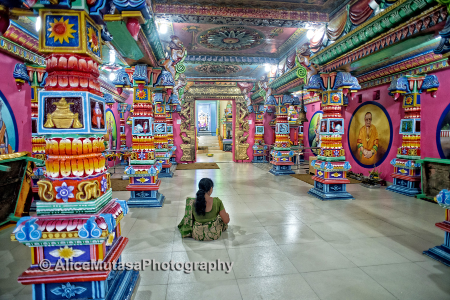 Quiet prayers in the extraordinary psychedelic interior of the Kali Kovil Temple, Trincomalee