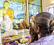 Prayers in a temple near the near the Sri Maha Bodhi, Anuradapura
