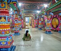 Quiet prayers in the extraordinary psychedelic interior of the Kali Kovil Temple, Trincomalee