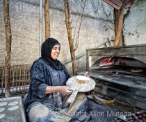 Raga making bread at Blueberry restaurant, near Saqqara