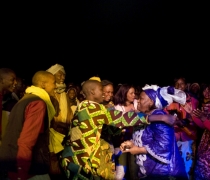 Fans greet Khaira Arby at the front of the stage