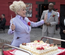 Barbara Windsor leading the singing of 'Happy Birthday' to Joan