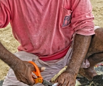 Anil preparing fish on the beach