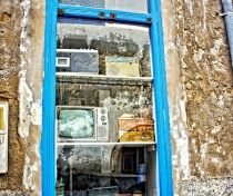 Mis-matched objects in a shop window inEssaouira