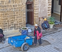 Renovation work to the mosque, while street life goes on as usual...