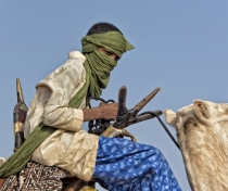 Young Touareg on his camel