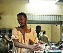 Soufiane preparing ful; Karima