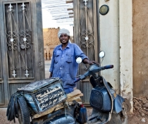 Moussa with his vespa; Omdurman