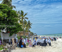 Schoolgirls coming from school - Paje beach